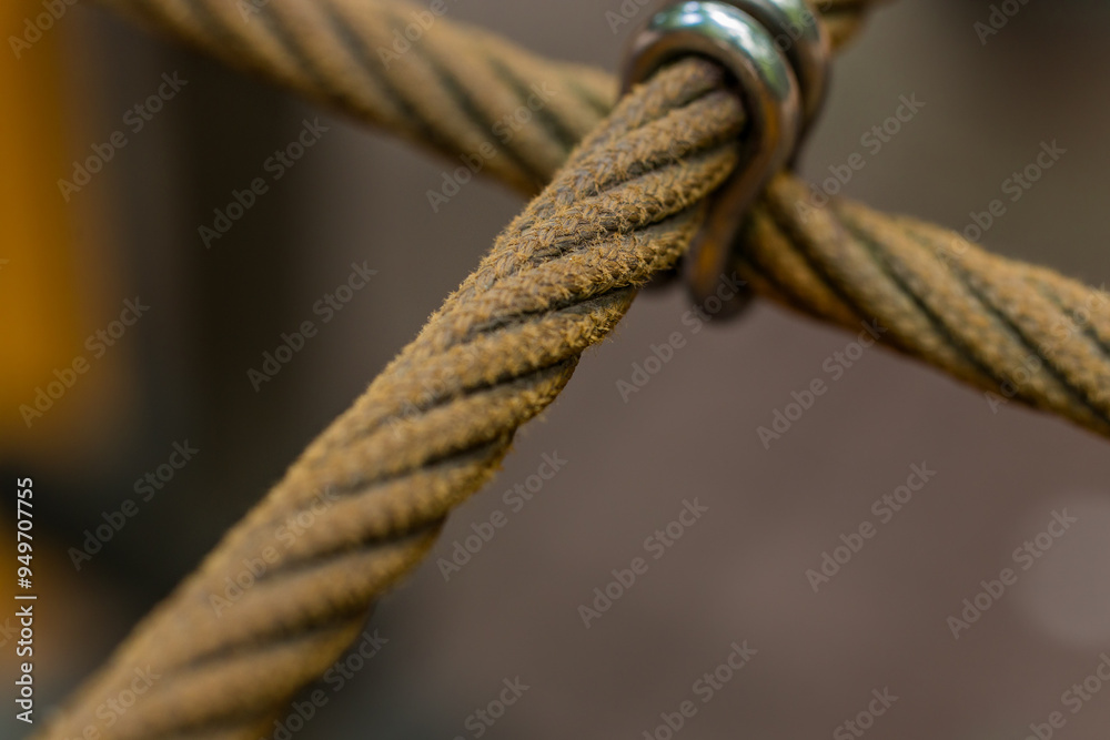 Wall mural rope crossing net nautical close up macro photography object with narrow focus old frayed material blurred background