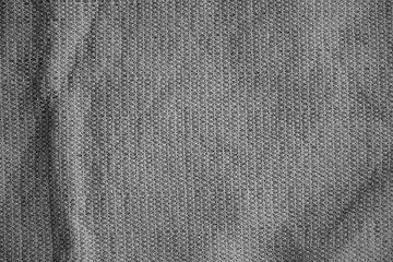 Processed image of fluffy gray doormat from bathroom in grey color