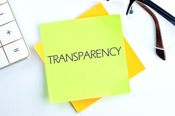 TRANSPARENCY word alphabet letters on a light green sticker on a light background