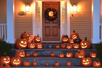 Lit Jack-o'-Lanterns on a Porch Steps for Halloween