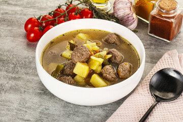 Soup with meatball and potato
