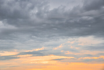 cloudy gloomy morning sky, dramatic low clouds with sunrise