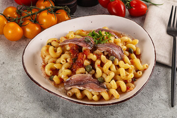 Italian pasta cellentani with anchovy