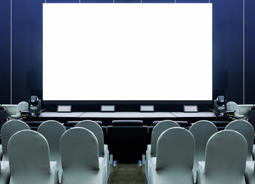 White screen display on stage with chairs for audience at business presentation exhibition