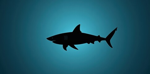 Fototapeta premium A Black Silhouette of a Shark Against a Blue Background