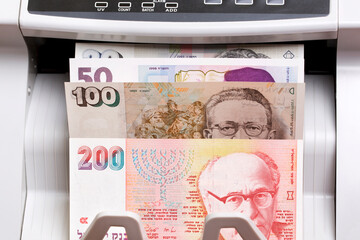 Israeli new shekel in the counting machine