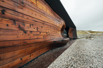 Viewpoint Snøhetta - Norwegian Wild Reindeer Pavilion - beautiful contemporary wooden architectural art masterpiece in Norwegian Tundra. Famous trekking and wild Muskox watching point