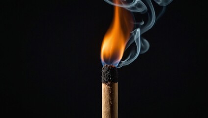 lit match on a black background