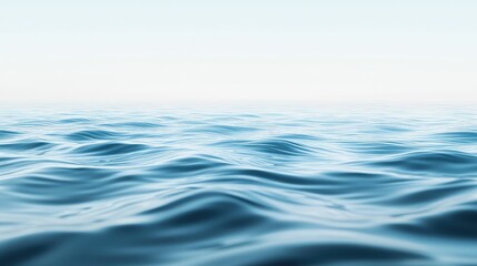 Naklejka premium Image of a smooth, undisturbed water surface with faint ripples and reflections suggesting the presence of invisible currents.