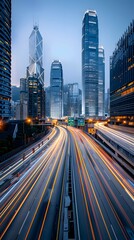 Obraz premium light trails of cars moving fast on the highway with skyscrapers