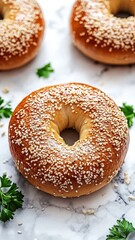 Freshly baked bagel with Sesame seed isolated on white background,Everything bagels topped with cream cheese,New York style bagels for breakfast,Homemade freshly baked bagels,space for text.