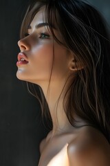 Fototapeta premium Beautiful Woman with Long Brown Hair and Soft Skin Close up Portrait