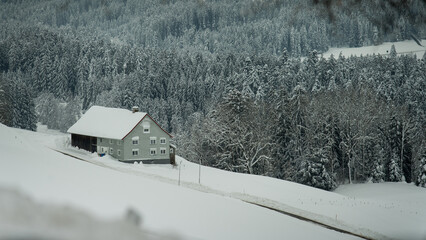 House in the German Alps in Allgäu in winter