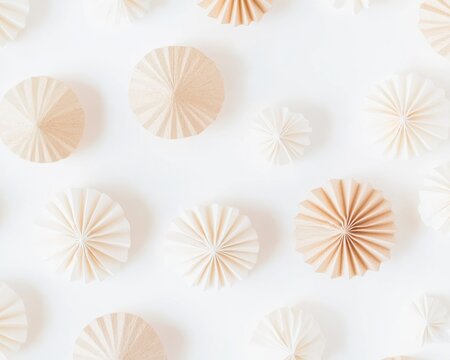 Pattern of origami paper balls, dried twigs, wooden stars and Christmas trees on a gray background. Christmas layout. Flat lay.