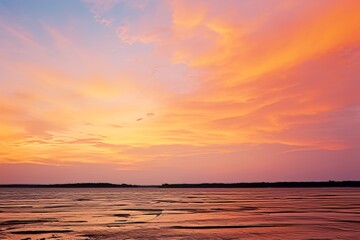Obraz premium Stunning Sunset Sky Over Calm Water - Landscape Photography