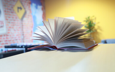 open books on the table. close-up of a fanned book