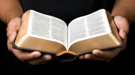 Soft light highlights a woman's hands as she reads an open Bible in a church, creating a serene atmosphere during a Christian celebration focused on spirituality