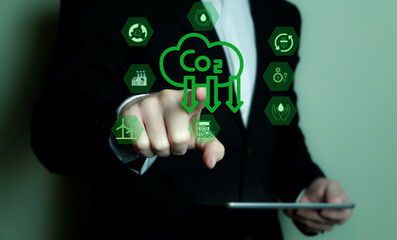 Reducing CO2 emissions and carbon footprint, green business.