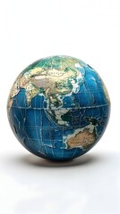 Fototapeta premium Modern Iconic Globe with Latitude and Longitude Lines Representing Global Connectivity on Isolated White Background