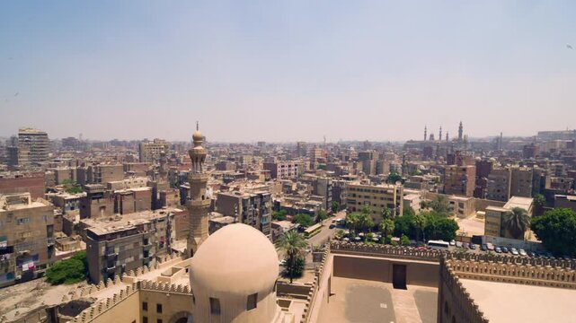 Cityscape View From The Minaret Of The Ibn Tulun Mosque In Cairo, Egypt. Aerial Panning Shot