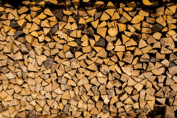 stack of firewood. pile of wood ready for winter fireplace heating
