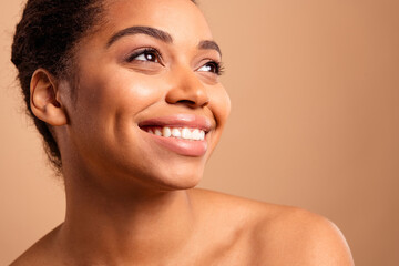 Photo of stunning dreamy lady look empty space bare shoulders isolated on beige pastel color background