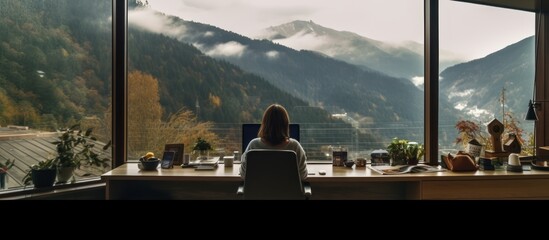 Working with a View: Woman at a Desk in a Mountain Retreat