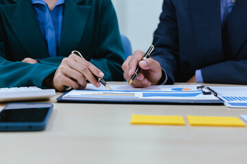 A busy office environment where teams collaborate on creative projects, finance, and marketing strategies using data, charts, and reports, engaging in brainstorming and training sessions to achieve bu