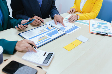 A busy office environment where teams collaborate on creative projects, finance, and marketing strategies using data, charts, and reports, engaging in brainstorming and training sessions to achieve bu