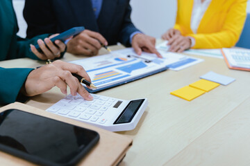 A busy office environment where teams collaborate on creative projects, finance, and marketing strategies using data, charts, and reports, engaging in brainstorming and training sessions to achieve bu