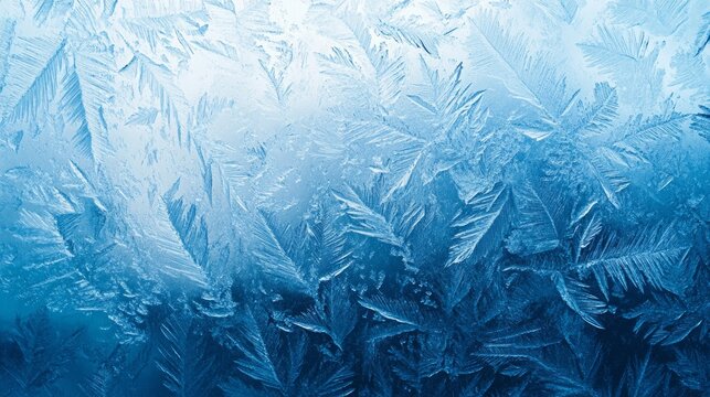 Frozen pattern on winter window. Blue ice winter background, texture blue wallpaper. Banner of fozen blue background