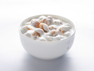 Dahi Boondi is a delicious side line dish. Soft and creamy gram flour dumplings added in yogurt.
