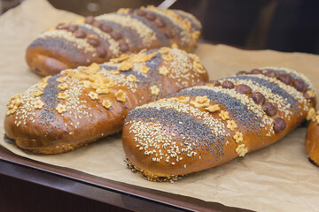 Delicious handmade bread loaves on a bakery counter