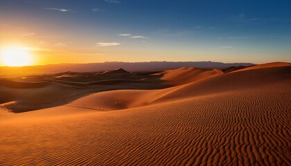 Stunning landscape of sand dunes at sunset in the desert