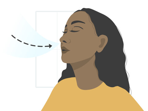 Side view of a woman do pursed lip breathing at home.