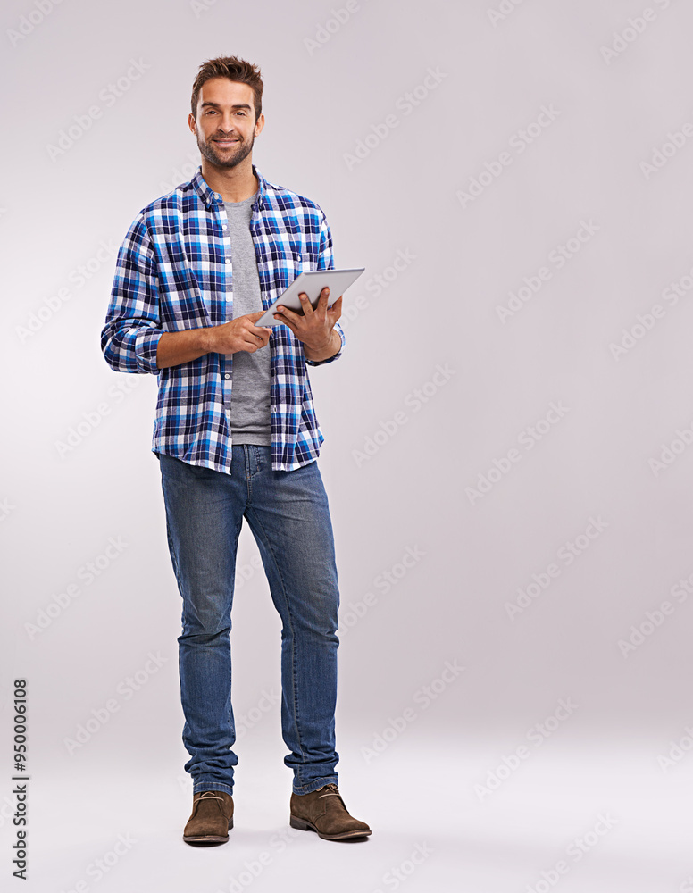 Poster typing, tablet and man with connection, portrait and communication on a grey studio background. pers