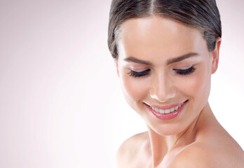 Space, relax and happy woman with makeup, eyeshadow or wellness in white background in studio. Mockup, smooth shine or confident girl model with glow, skincare cosmetics or beauty treatment results