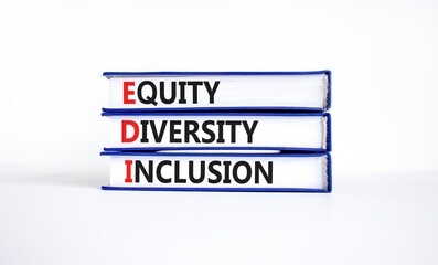 EDI equity diversity inclusion symbol. Concept words EDI equity diversity inclusion on books....