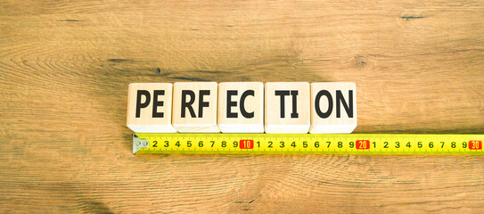 Perfection symbol. Concept word Perfection on beautiful wooden cubes. Beautiful wooden background. Beautiful yellow ruler. Business perfection concept. Copy space.