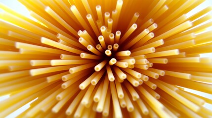 A Close-Up View of Spaghetti Pasta, Capturing the Golden Hue and Detailed Texture of the Uncooked Noodles in a Radial Pattern