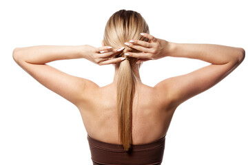 Back view of young woman with perfect blonde hair, doing low ponytail isolated on white studio background. Natural beauty, hair care and advanced cosmetology, health and beauty treatment concept