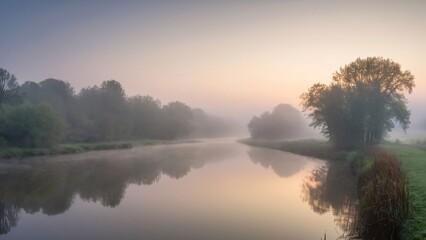 Obraz premium Tranquil Misty River at Dawn