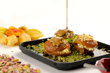 Turkish Indulgence: Şekerpare with Clotted Cream and Pistachios