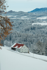 House in the German Alps in Allgäu in winter