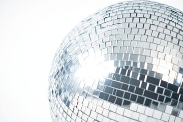 Fototapeta premium close-up of a silver disco ball with a slightly distorted reflection, showcasing its spherical shape and metallic sheen, isolated on a white background