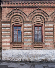 The stunning exterior of the Omar Efendi Mosque showcases the unique brickwork, arched windows, and detailed design elements that reflect the architectural heritage of Shaki, Azerbaijan