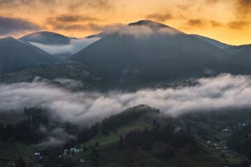 Summer morning in the Carpathian Mountains. Morning fog in the mountains. Nature of Ukraine