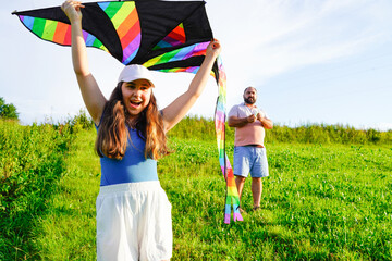 Father and kids playing in the meadow