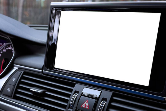 Monitor in car isolated blank screen for navigation maps and GPS rearview camera and parking assistant. Car display with blank white screen for design mock up, copy space.