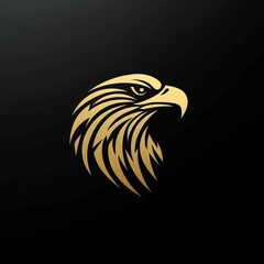 Obraz premium A stylized golden eagle head logo on a dark background, symbolizing strength and freedom.